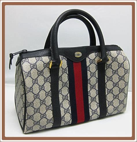 gucci bauletto vintage - vintage Gucci handbags from 1980s.